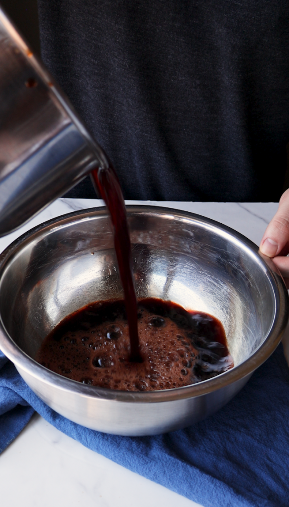 go back and forth between bowls to cool down the tea after it's done boiling